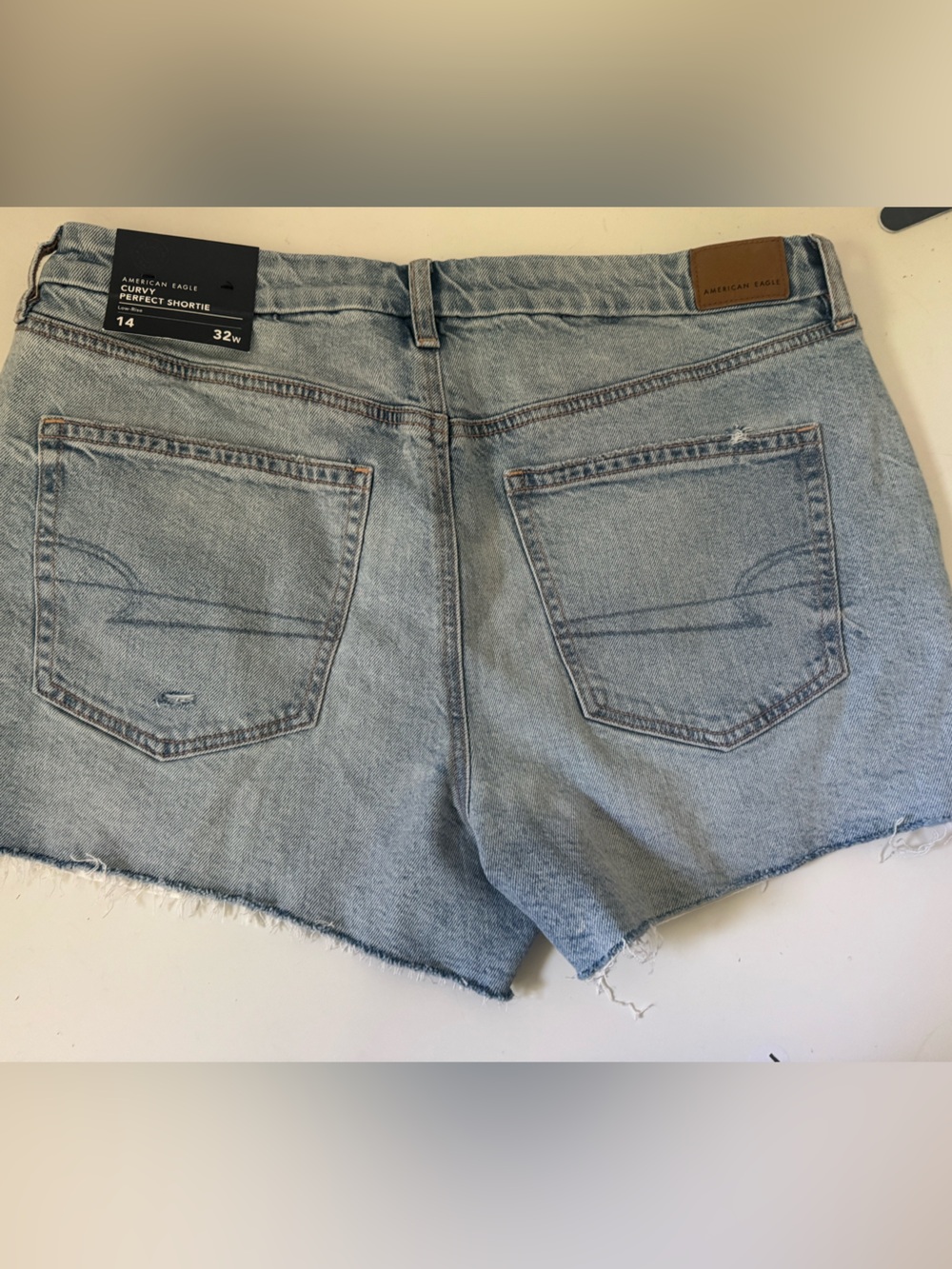 American Eagle Outfitters Light Wash Distressed Denim Cutoff Shorts - Picture 9 of 14